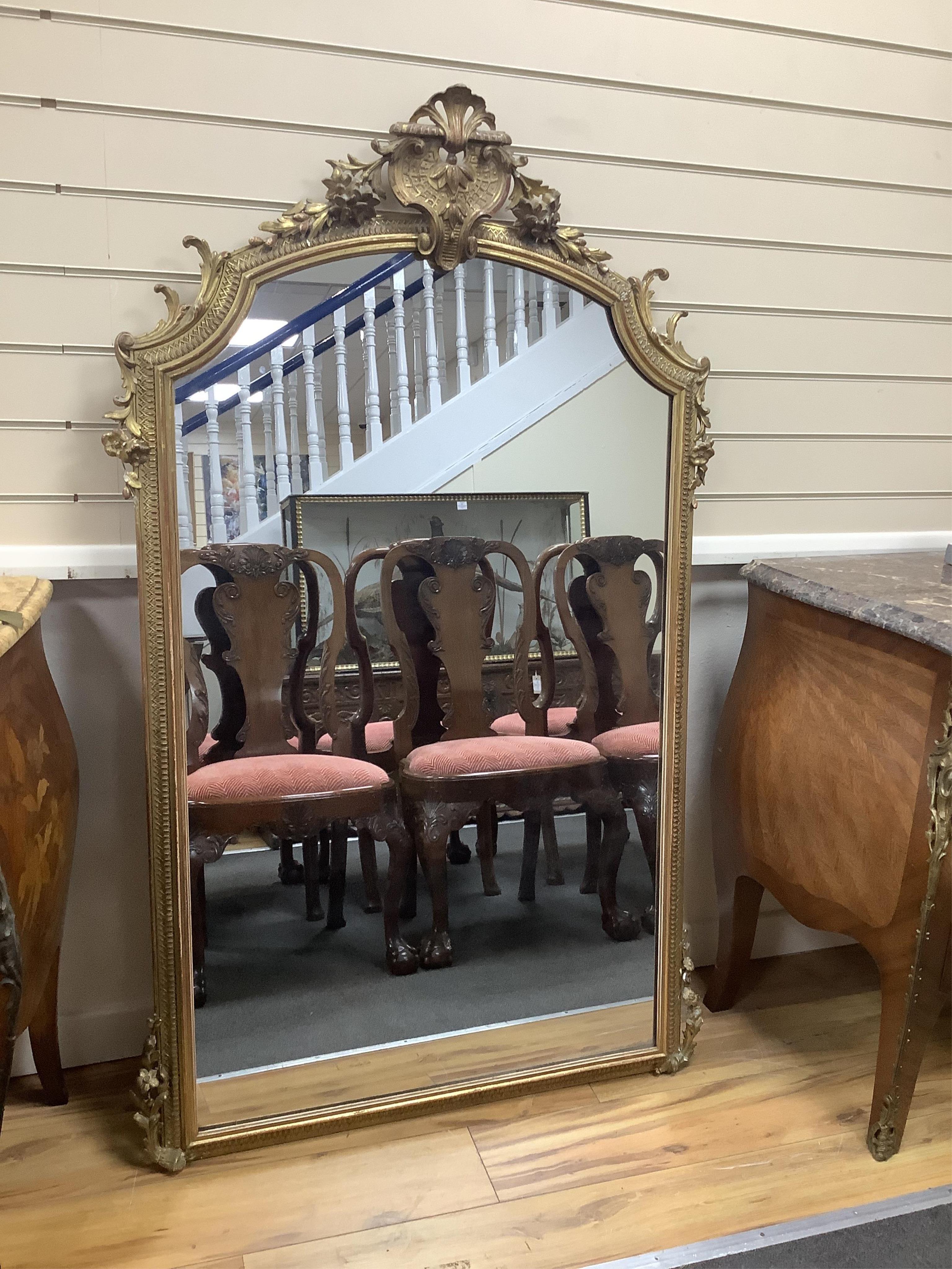 A French gilt and carved overmantel mirror, width 94cm, height 152cm. Condition - fair